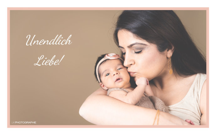 Ein Bild mit Mama und Baby auf dem Arm © Copyright UK Photographie
